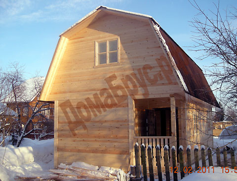 Фото: строительство дома из бруса зимой