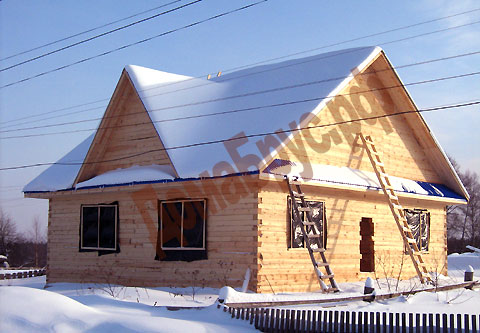 Фото: строительство брусового дома, зимой